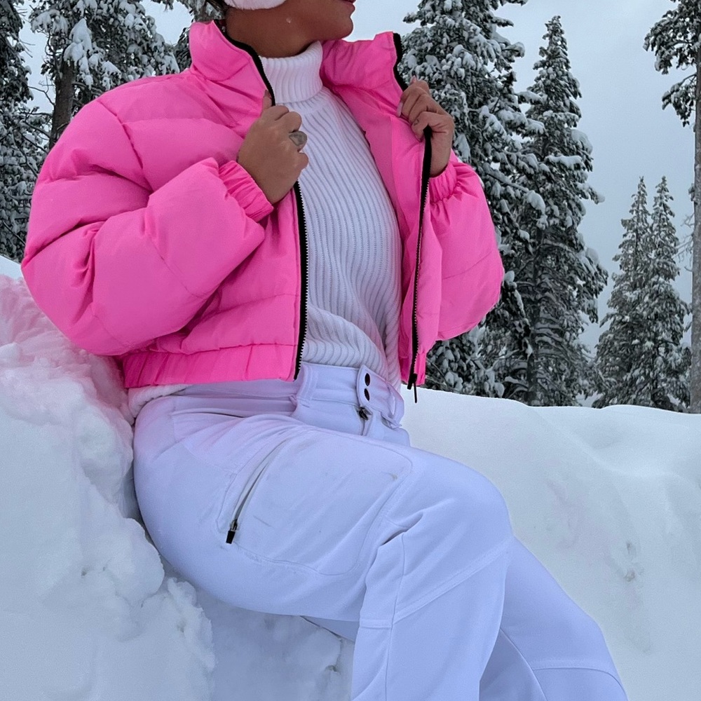 Neon pink puffer coat